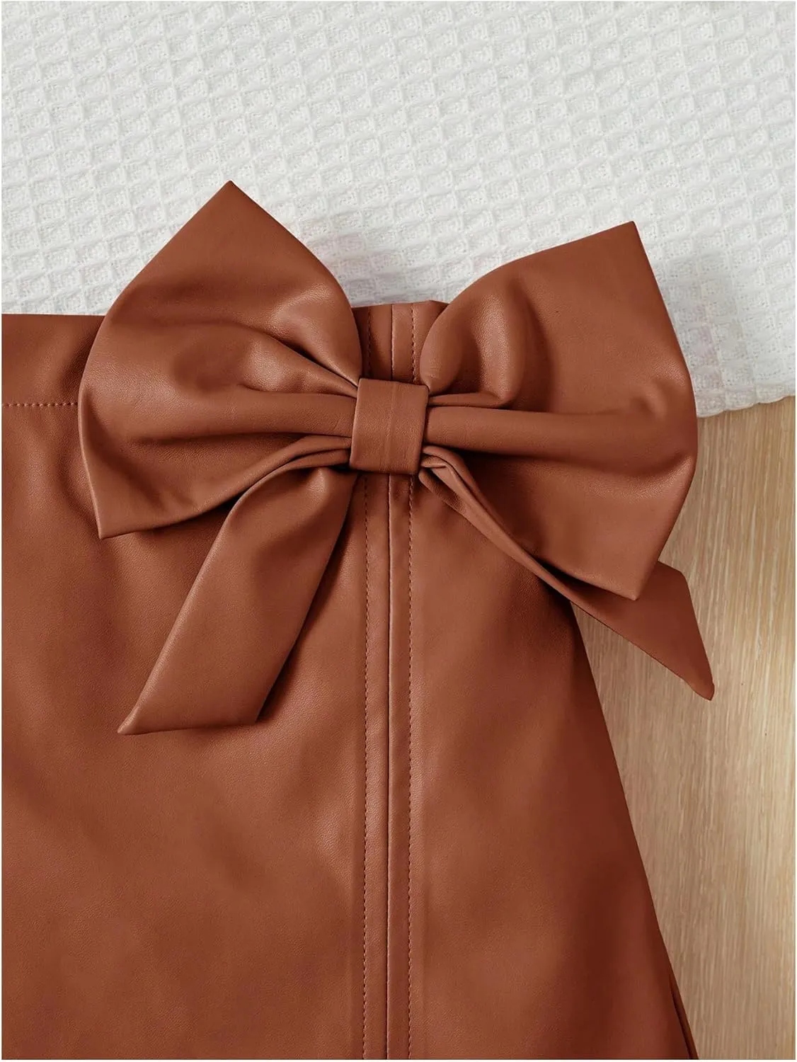 Girl's Cute PU Leather Skirt Elastic High Waist Split Hem Bow Front Mini Skirts