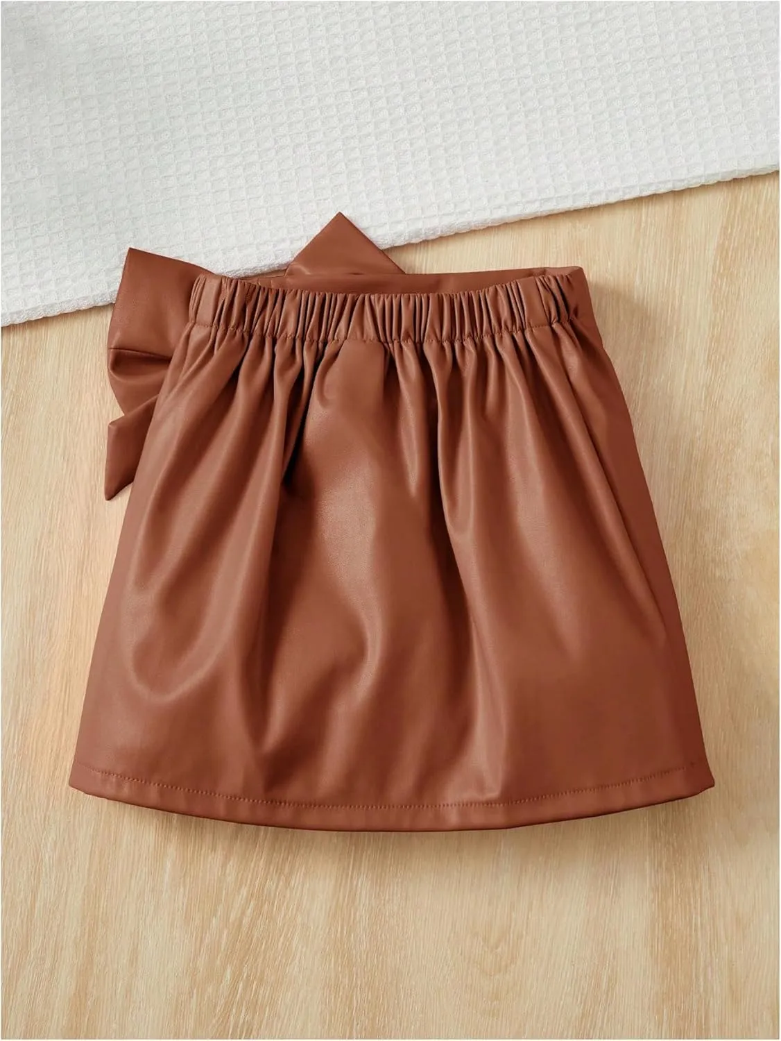 Girl's Cute PU Leather Skirt Elastic High Waist Split Hem Bow Front Mini Skirts